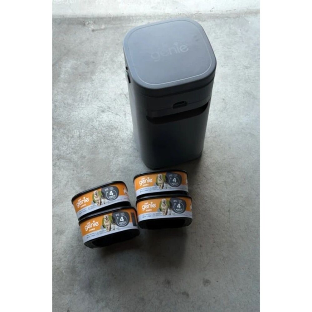 Brand new Pet Litter Genie with 4 refills